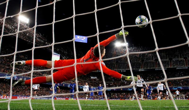 Chelsea goalkeeper Kepa Arrizabalaga saves Dani Parejo's penalty. Reuters