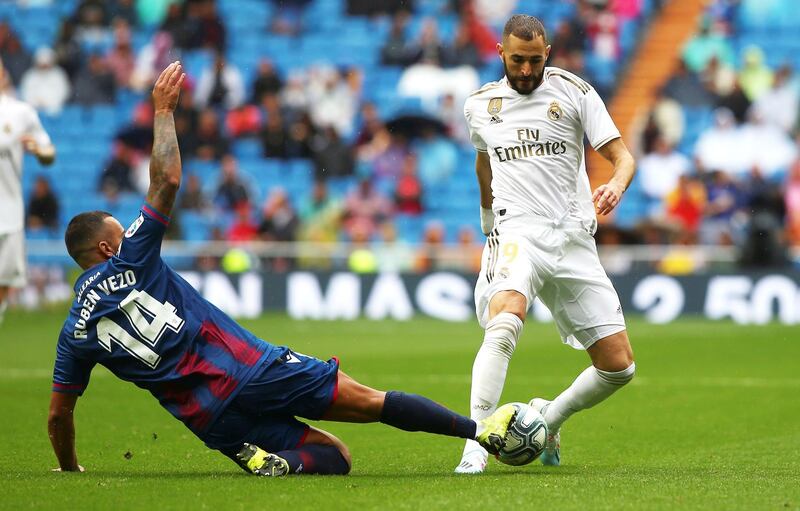 Real Madrid's Karim Benzema in action against Levante's Ruben Vezo. EPA