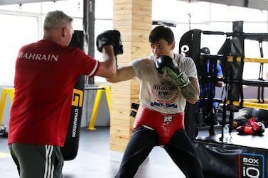 Denis Latypov, Bahrain boxer who will be competing at Tokyo Olympics with his coach Tony Davis during the training at the Gym Nation gym in Al Quoz in Dubai on July 7,2021. Pawan Singh/The National. Story by John