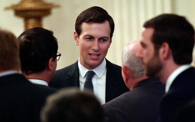 FILE - In this June 29, 2018, file photo, White House adviser Jared Kushner speaks with people as they wait for President Donald Trump to arrive to speak about taxes during an event in the East Room of the White House in Washington. U.S. officials say the Trump administration is staffing up a Middle East team at the White House in anticipation of rolling out its much-heralded but largely mysterious Israeli-Palestinian peace plan in the coming months. The National Security Council began last week to approach other agencies seeking volunteers to join the team, which will work for Trumpâ€™s Mideast peace pointmen Kushner and Jason Greenblatt, according to the officials. (AP Photo/Susan Walsh, File)