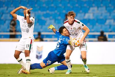 Goalkeeper Martin Nicolas Campana Delgado from Al Riyadh saves during the Saudi Pro League football match against Al Ettifaq. Getty