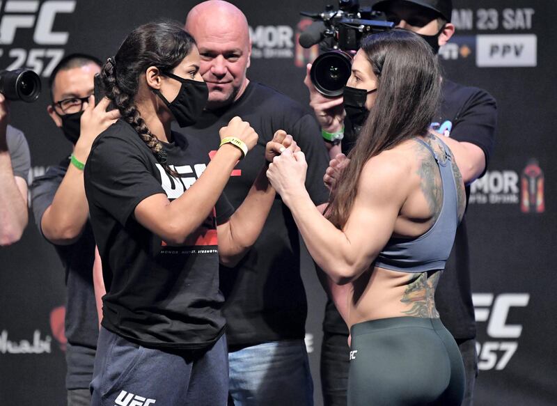 ABU DHABI, UNITED ARAB EMIRATES - JANUARY 22: (L-R) Opponents Julianna Pena and Sara McMann face off during the UFC 257 weigh-in at Etihad Arena on UFC Fight Island on January 22, 2021 in Abu Dhabi, United Arab Emirates. (Photo by Jeff Bottari/Zuffa LLC) *** Local Caption *** ABU DHABI, UNITED ARAB EMIRATES - JANUARY 22: (L-R) Opponents Julianna Pena and Sara McMann face off during the UFC 257 weigh-in at Etihad Arena on UFC Fight Island on January 22, 2021 in Abu Dhabi, United Arab Emirates. (Photo by Jeff Bottari/Zuffa LLC)