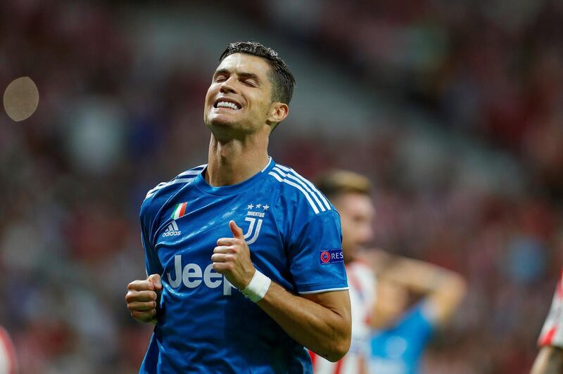 Juventus forward Cristiano Ronaldo reacts after missing a late chance to win the match. AFP