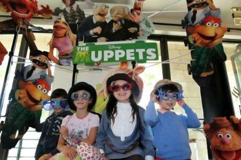 A new generation of Muppets fans attends the gala screening at the Dubai International Film Festival yesterday. Pawan Singh / The National