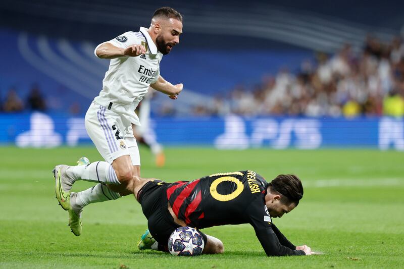 Dani Carvajal - 6. Engaged in a feisty tussle with Grealish, and while the fullback battled hard to contain the City winger, Grealish carved out some good openings down his flank. EPA