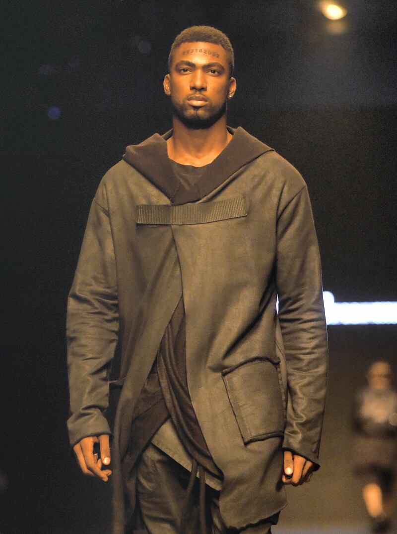 A model walks the runway during the Uniti by Babak Vosoughi Menswear show at Fashion Forward October 2017 held at the Dubai Design District on October 27, 2017 in Dubai, United Arab Emirates.