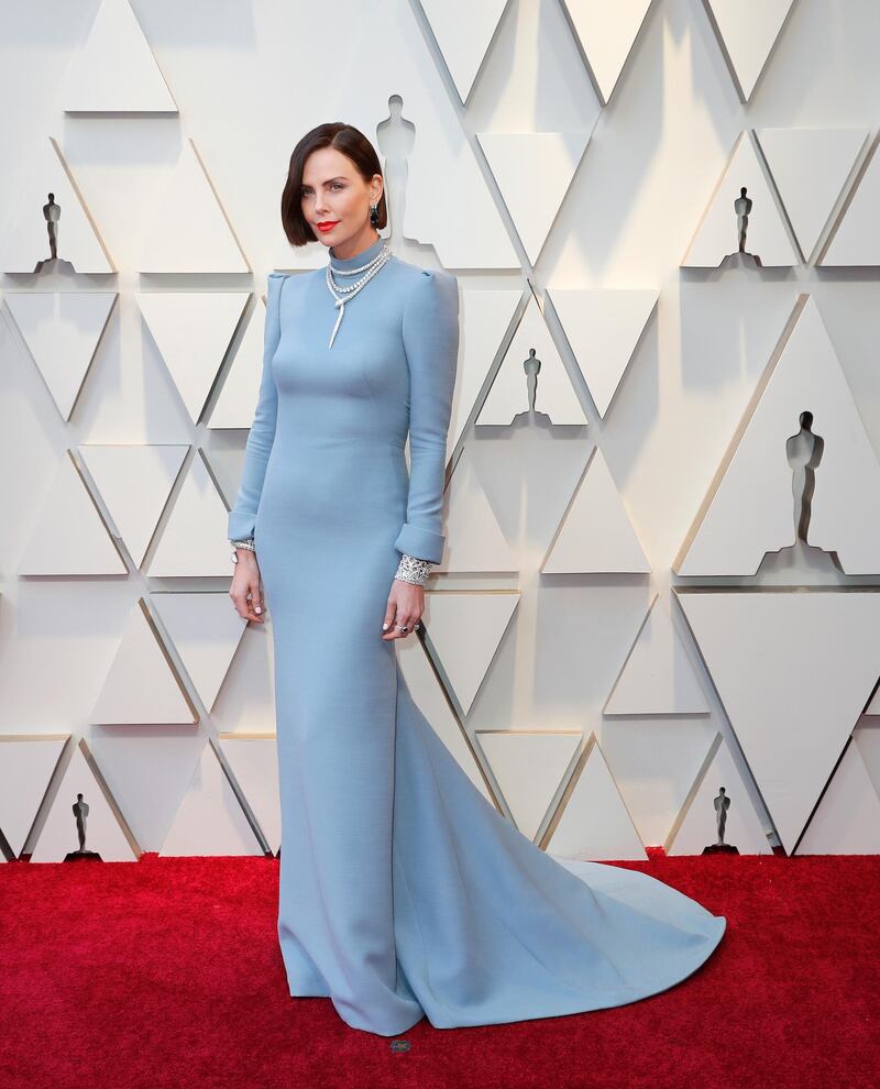 epa07394636 Charlize Theron arrives for the 91st annual Academy Awards ceremony at the Dolby Theatre in Hollywood, California, USA, 24 February 2019. Blue dress by Dior Haute Couture, Serpenti design jewels by Bulgari. The Oscars are presented for outstanding individual or collective efforts in 24 categories in filmmaking.  EPA-EFE/ETIENNE LAURENT