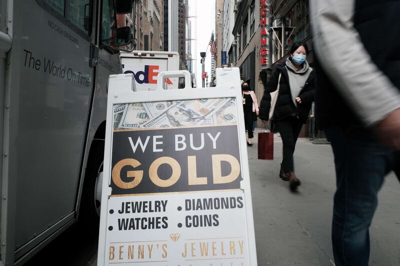 A sign outside a shop in Manhattan's jewellery district. Spot gold hit a one-year high earlier this week. AFP