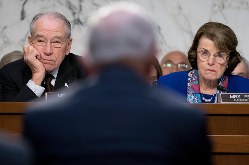 epa06427570 Senate Judiciary Committee Chairman Republican Senator from Iowa Chuck Grassley (L) and Ranking Member of the committee Democratic Senator from California Dianne Feinstein (R) listen to US Attorney General Jeff Sessions (C) testify before the Senate Judiciary Committee hearing on oversight of the US Department of Justice, on Capitol Hill in Washington, DC, USA, 18 October 2017 (reissued 09 January 2018). Senator Dianne Feinstein, top Democrat on the Judiciary Committee released a transcript of testimony by Fusion GPS, the firm that put the dossier on Russian efforts to aid the Trump Campaign.  The move escalates tensions with the GOP and Senator Chuck Grassley.  EPA/MICHAEL REYNOLDS