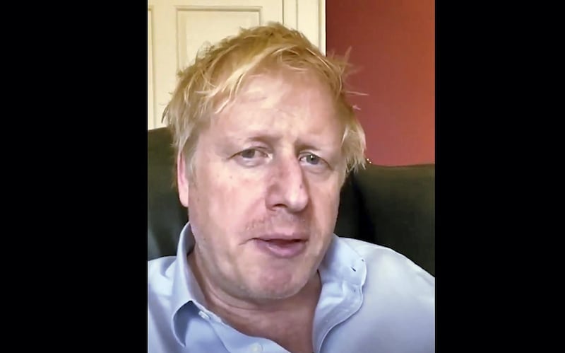 A still image from footage released by 10 Downing Street, the office of the British prime minister, on April 3, 2020 shows Britain's Prime Minister Boris Johnson in 10 Downing Street central London giving an update on his condition after he announced that he had tested positive for the new coronavirus on March 27, 2020. - British Prime Minister Boris Johnson was in "good spirits" on April 6 and remained in charge of the government despite his admission to hospital for tests after suffering "persistent symptoms" of coronavirus 10 days after being diagnosed, officials said. (Photo by - / 10 Downing Street / AFP) / RESTRICTED TO EDITORIAL USE - MANDATORY CREDIT "AFP PHOTO / 10 DOWNING STREET " - NO MARKETING - NO ADVERTISING CAMPAIGNS - DISTRIBUTED AS A SERVICE TO CLIENTS