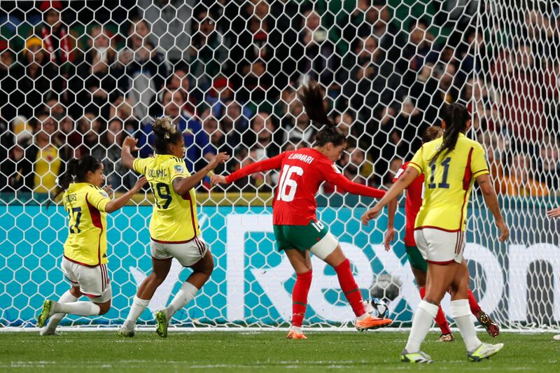 Morocco's Anissa Lahmari shoots to score her side's first goal. AP