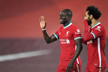 Liverpool's Sadio Mane (L) celebrates with Mohamed Salah during the 4-0 win against Wolves at Anfield. EPA