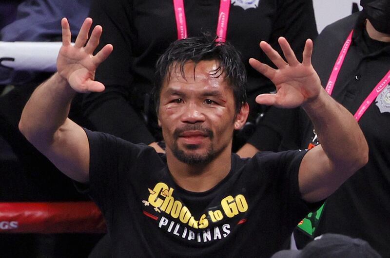 Manny Pacquiao gestures to fans after his defeat. AFP