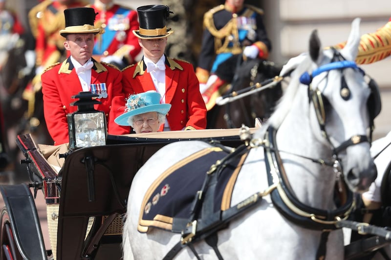 Queen Elizabeth II leaves Buckingham palace during Trooping The Colour on the Mall in London, England. The annual ceremony involving over 1400 guardsmen and cavalry, is believed to have first been performed during the reign of King Charles II. The parade marks the official birthday of the Sovereign, even though the Queen's actual birthday is on April 21st.  Photo by Chris Jackson / Getty Images