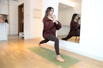Salwa Attiga teaches pilates and hosts classes in her City Walk apartment. Pawan Singh / The National