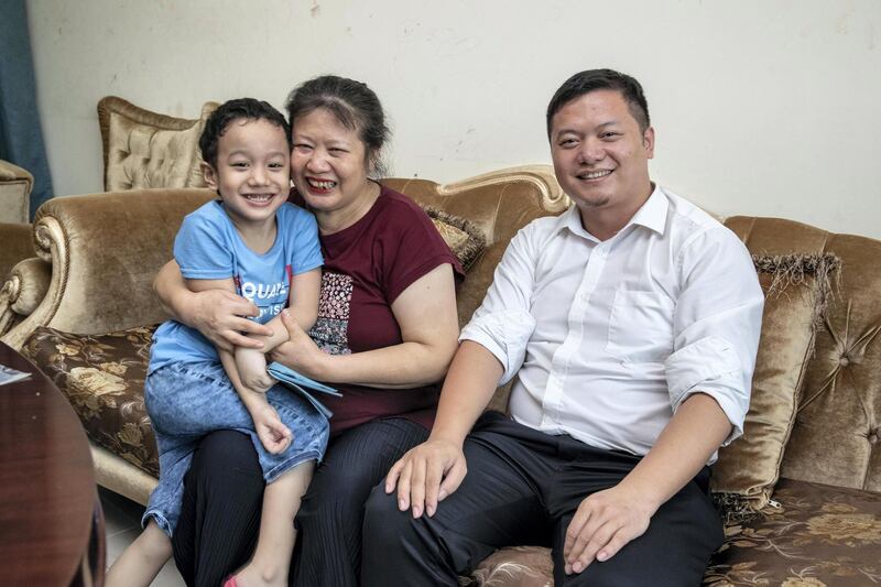 DUBAI, UNITED ARAB EMIRATES. 25 AUGUST 2020. UAE residents on how their home countries handled the pandemic. This is part of six case studies of residents of different nationalities. Can Cai, an assistant with a legal firm in Dubai has had his mother, Ying Luo, and five-year-old son, Tiancheng Cai, with him since January. They visited for Chinese New Year and will return to Chengdu city in Sichuan province later this year when more flights open up and cheaper tickets are available. (Photo: Antonie Robertson/The National) Journalist: Ramola Talwar. Section: National.