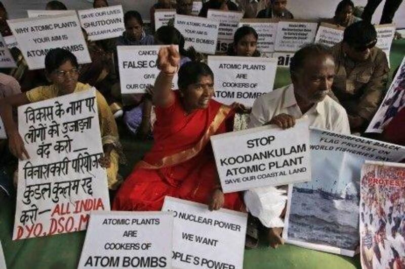 People living near nuclear plant sites shout slogans during an anti-nuclear protest in New Delhi.