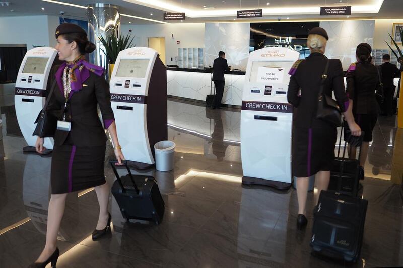 For Etihad crew members, the journey starts when they swipe their ID cards at one of 11 kiosks. Delores Johnson / The National