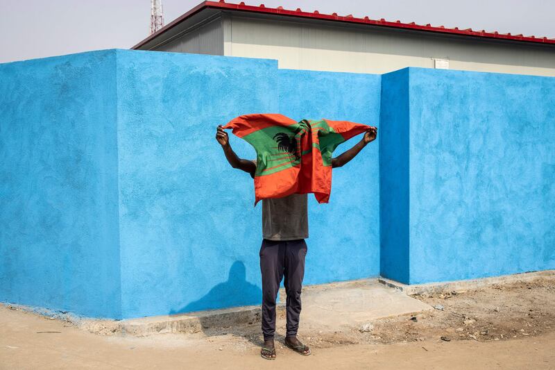 A supporter of Angolan opposition party National Union for the Total Independence of Angola in Luanda during a final campaign rally before the general election on August 24. AFP