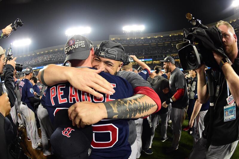 Boston Red Sox first baseman Steve Pearce celebrates with teammates. Reuters