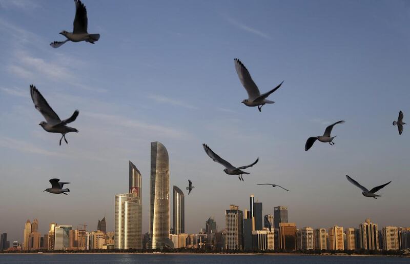 ABU DHABI, UNITED ARAB EMIRATES: a two-bedroom apartment of up to 1,400 square feet in investment zones such a Raha Beach or Reem Island; or a three-bedroom apartment/villa in mainland locations measuring up to 4,500 square feet. Kamran Jebreili / AP Photo