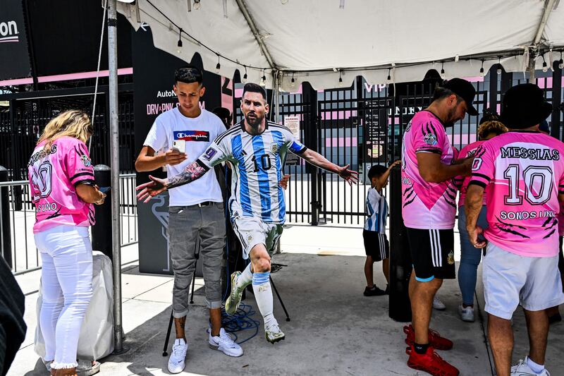 Lionel Messi fans wait for his arrival at the DRV PNK Stadium in Fort Lauderdale, Florida. AFP