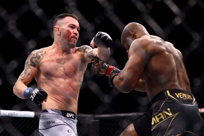 Colby Covington punches Kamaru Usman in their welterweight title bout during UFC 268 in November, 2021 in New York City. AFP
