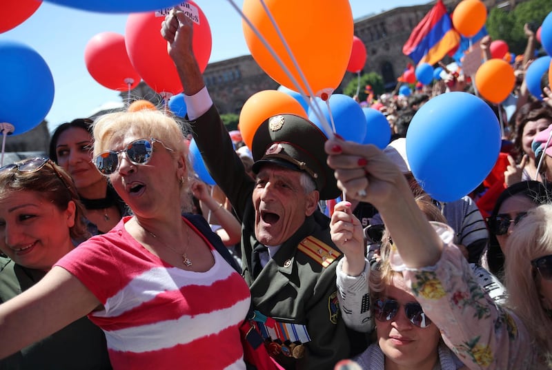 Supporters of the opposition politician Nikol Pashinian shout slogans during a rally at the Republic square in Yerevan, Armenia. Thanassis Stavrakis / AP Photo