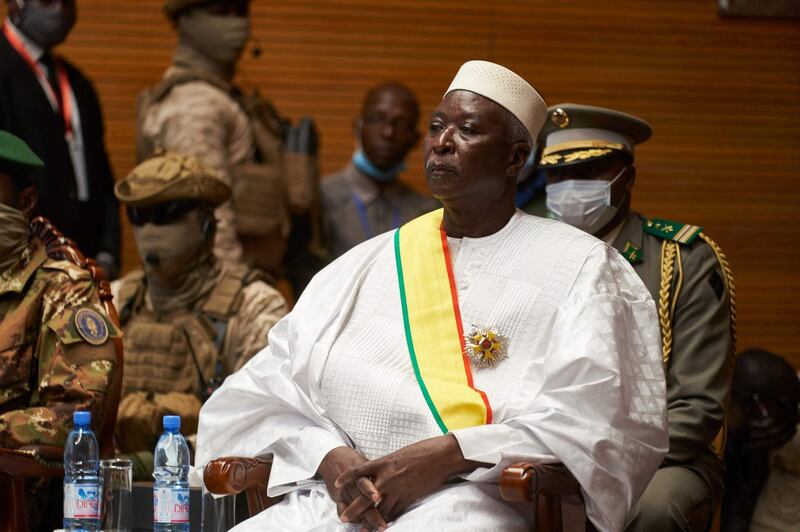 (FILES) In this file photo taken on September 25, 2020 transition Mali President Bah Ndaw is seen during his inauguration ceremony at the CICB (Centre International de Conferences de Bamako) in Bamako.  Soldiers took Mali's interim president and prime minister to a military base outside of the capital Bamako on May 24, 2021, two officials in the unstable West African country said. An official at the prime ministers's office said President Bah Ndaw and Prime Minister Moctar Ouane had both been taken to the Kati military camp near the capital. 
 / AFP / MICHELE CATTANI
