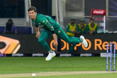 (FILES) In this file photo taken on October 24, 2021, Pakistan's Shaheen Shah Afridi delivers a ball during the ICC men’s Twenty20 World Cup cricket match between India and Pakistan at the Dubai International Cricket Stadium in Dubai.  - Fierce rivals India and Pakistan will clash in the Asia Cup cricket Twenty20 tournament in a August 28, 2022 blockbuster at Dubai.  The two nations now only play each other in multi-nation contests due to political tensions and last met during a T20 World Cup clash at the same venue in 2021.  (Photo by Aamir QURESHI  /  AFP)  /  RESTRICTED TO EDITORIAL USE To go with 'Cricket-Asia-IND-PAK' by Faisal KAMAL