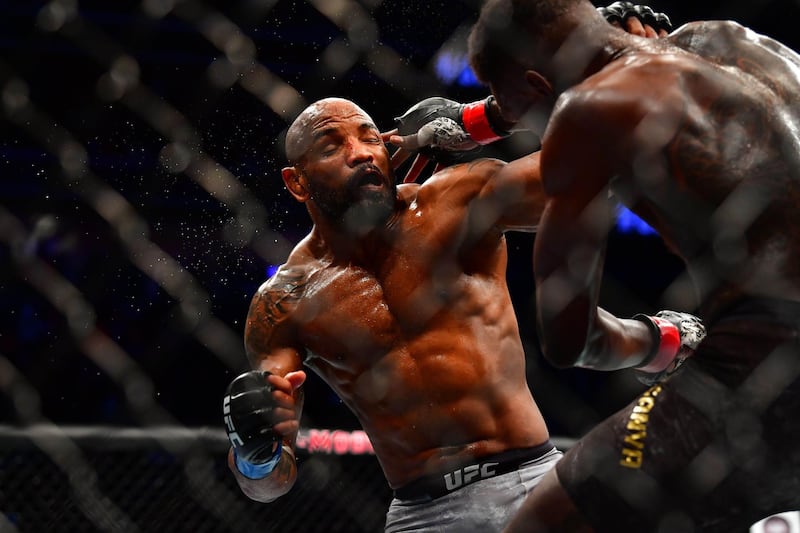 Israel Adesanya lands a punch on Yoel Romero during UFC 248. Reuters
