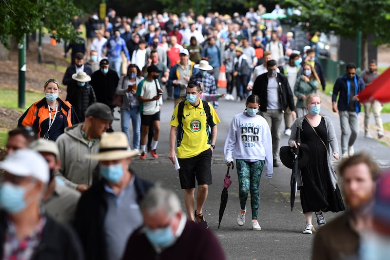Cricket fans arrive on the first day of the third Ashes Test between Australia and England in Melbourne, Australia. EPA