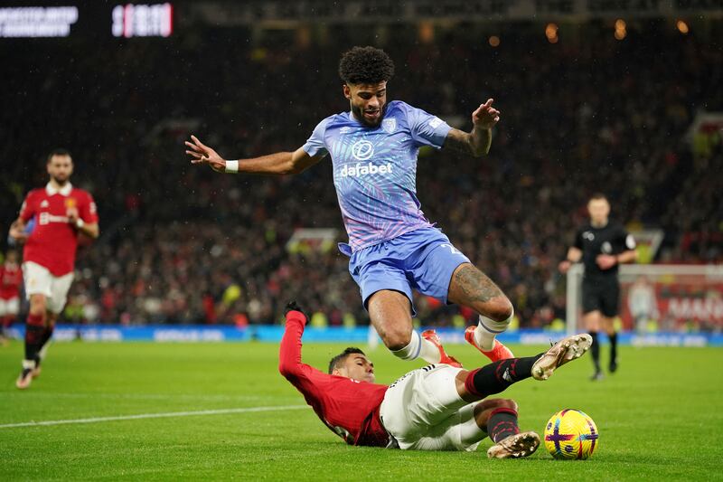 Manchester United's Casemiro tackles Philip Billing of Bournemouth. AP