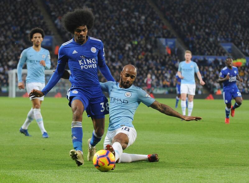 Leicester's Hamza Choudhury, centre left, and Manchester City's Ilkay Gundogan challenge for the ball. AP Photo