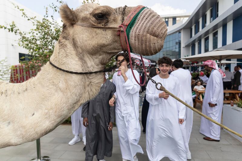 The school had a camel on campus for Union Day celebrations at Bloom World Academy.
Antonie Robertson/The National