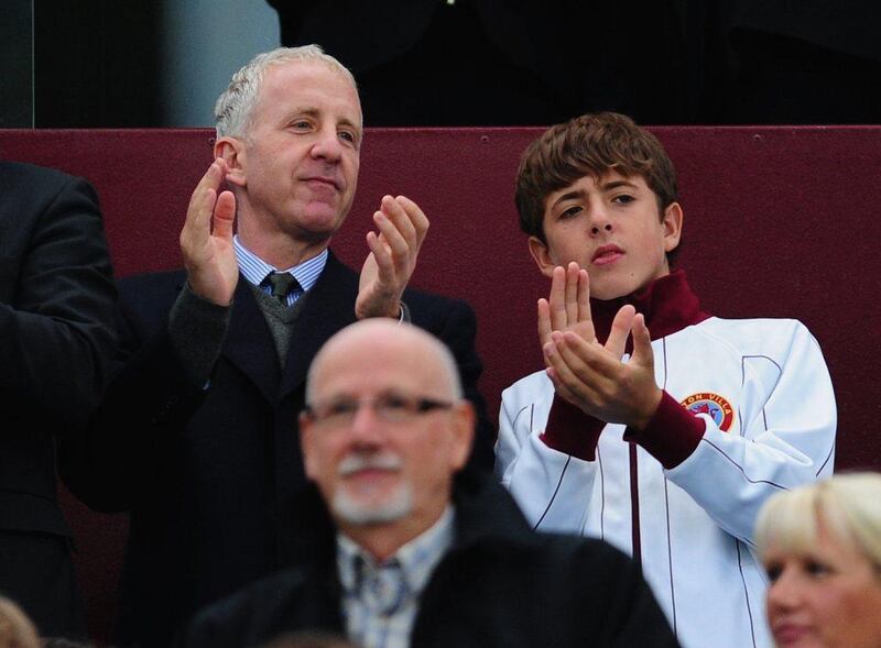 Aston Villa owner Randy Lerner, left, has announced his intentions to sell the club. Jamie McDonald / Getty Images 