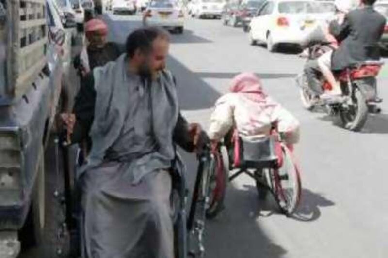 Social prejudice is one of the many challenges s disabled people in Yemen are facing. Here disabled men beg for money on a street in Sana'a.

Mohammed al Qadhi for The National *** Local Caption ***  dis2.JPG