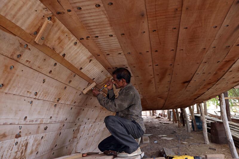 The factory produces only two or three large dhows at any given time.
