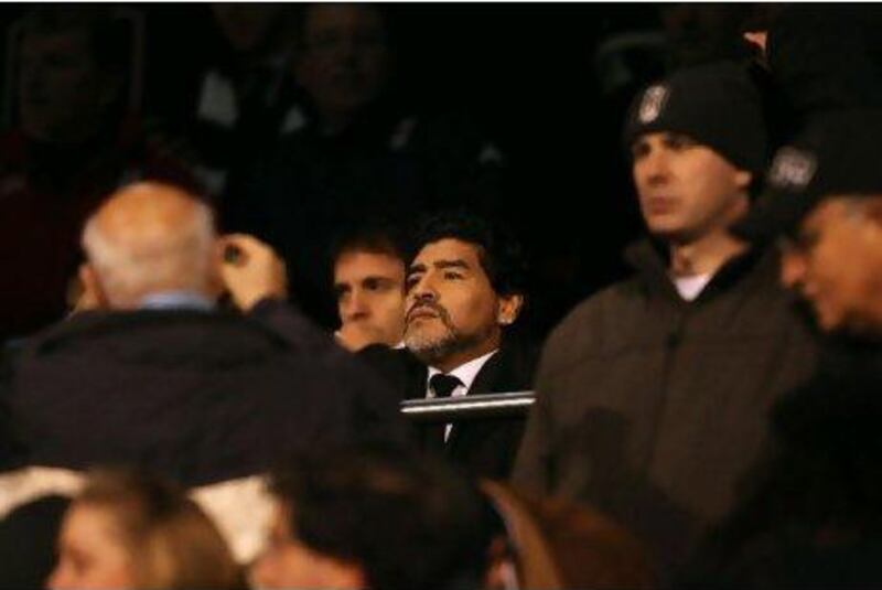 Diego Maradona, the former Argentina national team coach, watched as Carlos Tevez inspired Manchester City to a 3-0 win at Craven Cottage yesterday against Fulham.