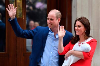 Britain's Prince William, Duke of Cambridge (L) and Britain's Catherine, Duchess of Cambridge show their newly-born son, their third child, to the media outside the Lindo Wing at St Mary's Hospital in central London, on April 23, 2018.   / AFP PHOTO / Ben STANSALL