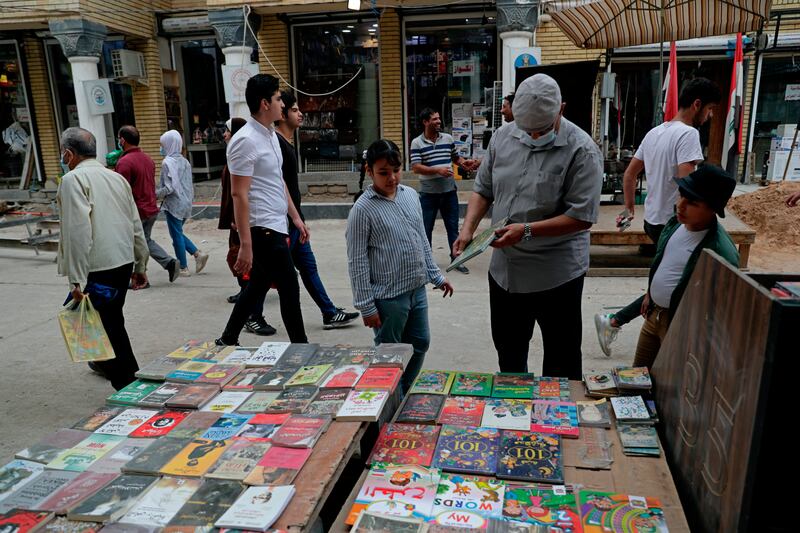 Pupils shop for school supplies in preparation for the new academic year in Baghdad, Iraq. AP