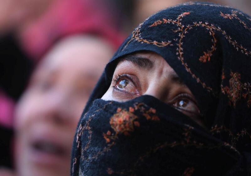 Muslim women pray at a shrine in Srinagar,  Kashmir. Farooq Khan / AFP Photo