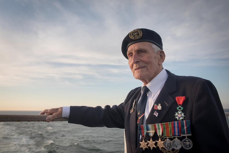 John Dennett was a member of the Royal Navy who was on a craft that landed on Gold Beach on D-Day. He is seen on a ferry headed to Caen, northern France, for a wreath-laying ceremony to mark the 74th anniversary of the Normandy Landings. All photos by Matt Cardy / Getty Images
