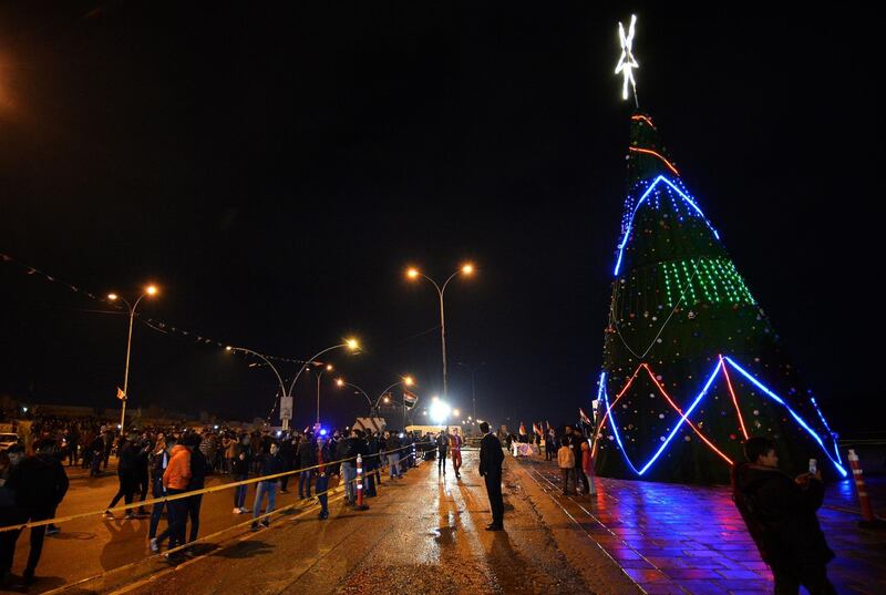 Iraqi people attend the celebrations for new year's eve in Mosul on December 31, 2018.   AFP