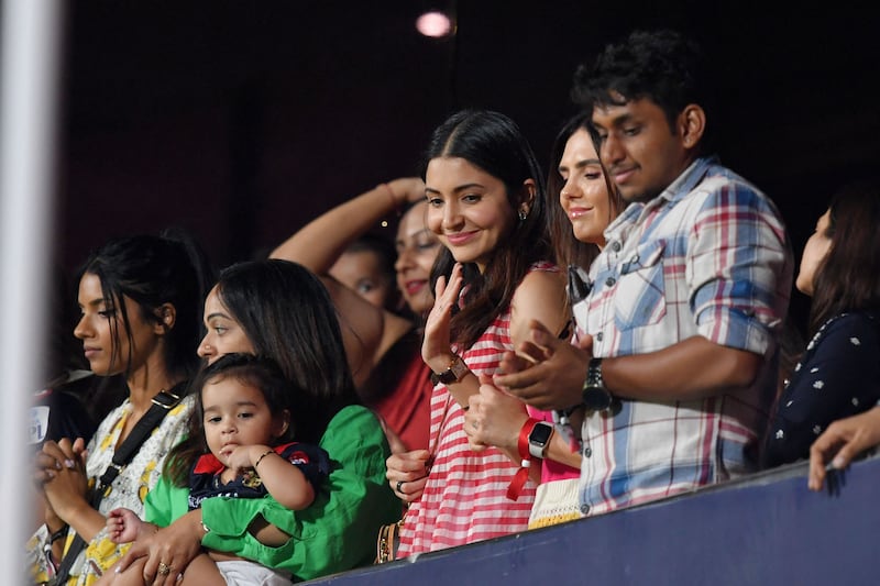 Bollywood star and wife of Virat Kohli, Anushka Sharma, centre, during the match between Royal Challengers Bangalore and Delhi Capitals at the Chinnaswamy Stadium in Bengaluru on April 15, 2023. AFP