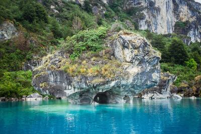 A major highlight of the Carretera Austral is the General Carrera Lake’s Marble Chapels, a network of glacial caves. Getty Images