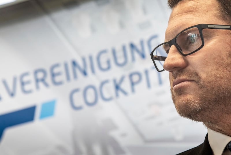 Martin Locher, President of the Vereinigung Cockpit (VC), looks on during a press conference in Frankfurt, Germany, Wednesday, Aug. 8, 2018 when announcing a 24hours strike of the German Ryanair pilots on Friday. (Frank Rumpenhorst/dpa via AP)