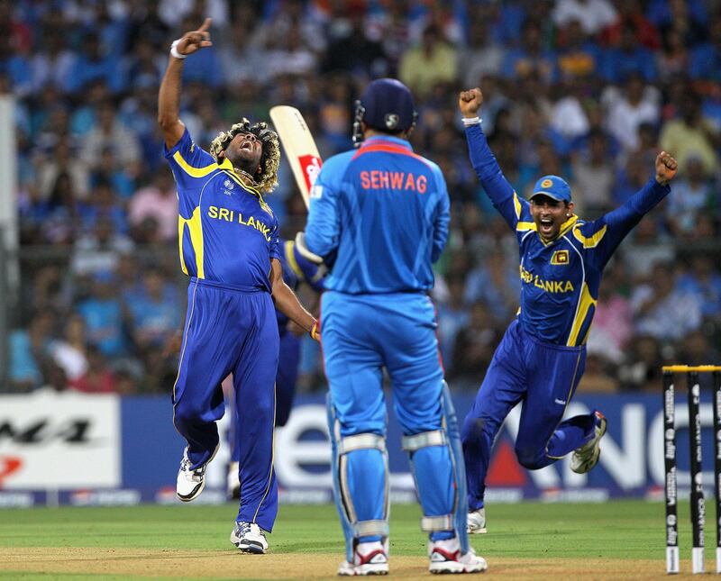MUMBAI, INDIA - APRIL 02:  Lasith Malinga of Sri Lanka celebrates the wicket of Virender Sehwag of India during the 2011 ICC World Cup Final between India and Sri Lanka at Wankhede Stadium on April 2, 2011 in Mumbai, India.  (Photo by Hamish Blair/Getty Images)