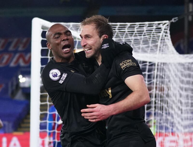 West Ham United's Craig Dawson celebrates scoring their third goal with Angelo Ogbonna. Reuters