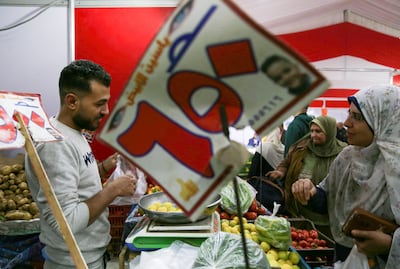 Shoppers at a food market in Cairo, Egypt, where inflation is in double digits. Reuters 